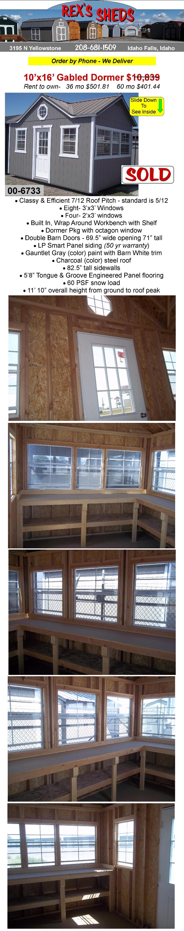 10x16_utility_shed_with_dormer_has_octagon_window_gauntlet_gray_paint_barn_white_trim_built_in_wrap_around_workbench_12_windows_charcoal_color_steel_roof