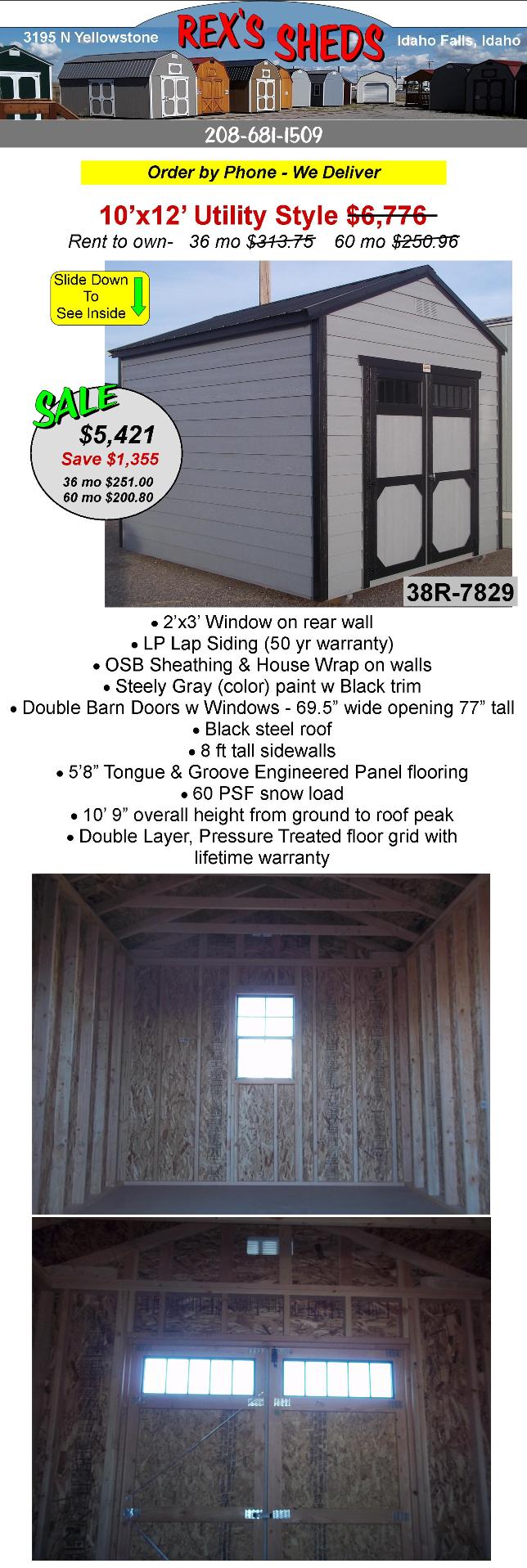 utility_shed_with_lap_siding_and_house_wrap_steely_gray_color_paint_black_trim_double_barn_doors_with_windows_plus_window_in_real_wall_and_black_steel_roof